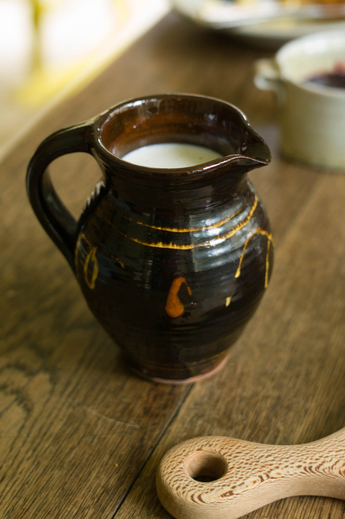 Black slipware milk jug by Clive Bowen